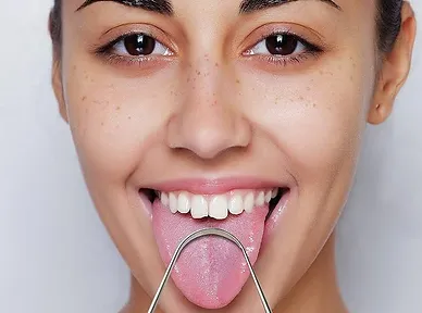 What Is Tongue Scraping and What Are the Benefits?